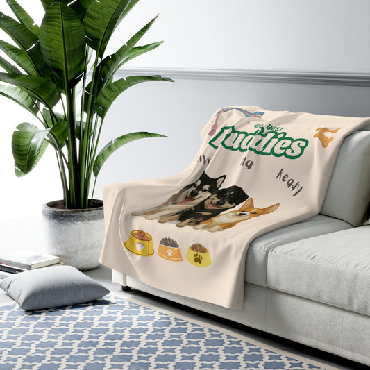 Blanket with dog illustration and text on a sofa in a living room setting