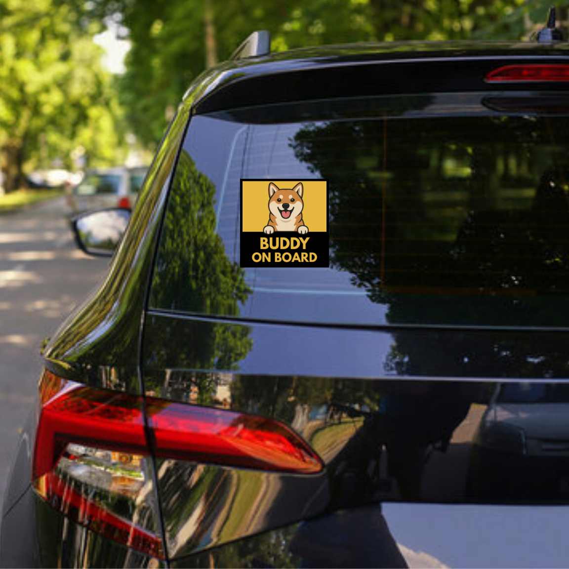 Car with a 'Buddy on Board' sticker on the back window